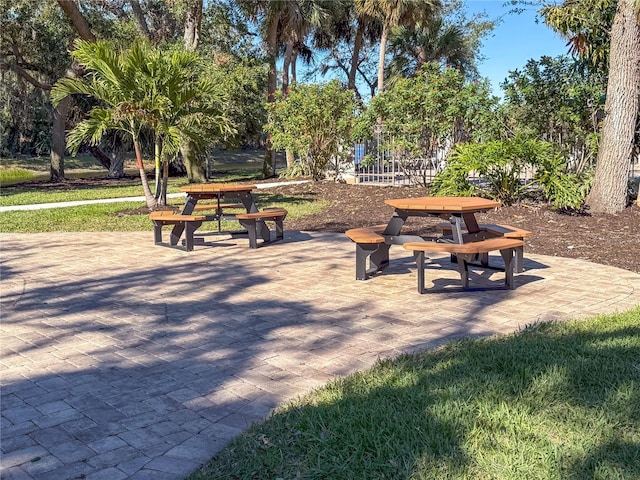 view of property's community featuring a patio