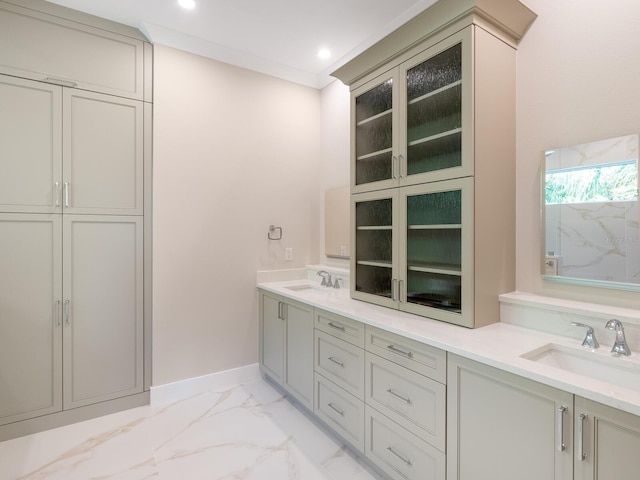 bathroom featuring vanity and ornamental molding