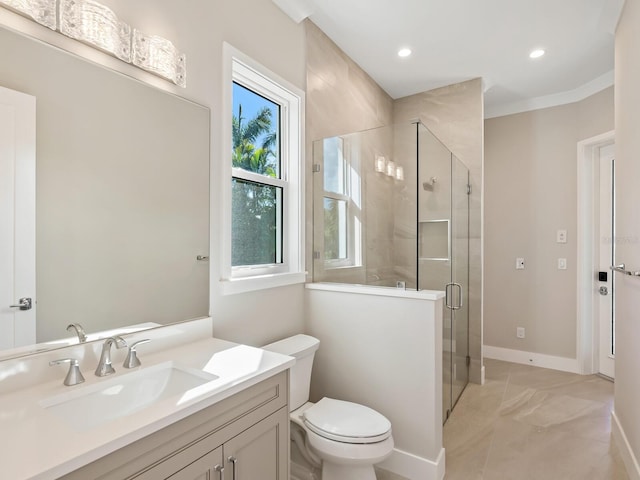 bathroom with a shower with door, vanity, and toilet