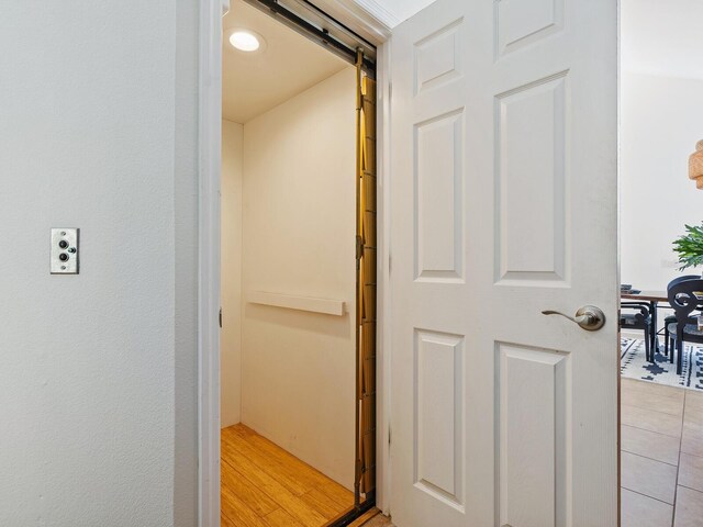 1214 Sea Plume Way, Sarasota, FL 34242 - hall featuring a barn door