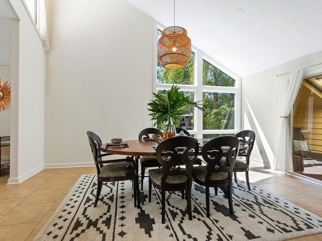 1214 Sea Plume Way, Sarasota, FL 34242 - dining room featuring light tile patterned floors and lofted ceiling