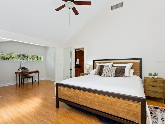 1214 Sea Plume Way, Sarasota, FL 34242 - bedroom with high vaulted ceiling, light wood-style floors, and a ceiling fan