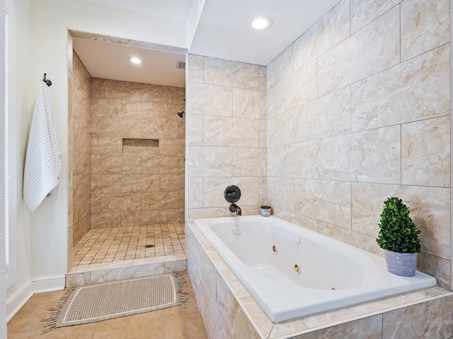 bathroom featuring tile patterned flooring, tiled shower, a jetted tub, and recessed lighting