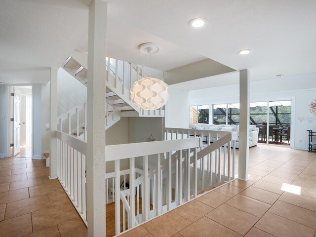 1214 Sea Plume Way, Sarasota, FL 34242 - hall featuring tile patterned floors, an upstairs landing, and recessed lighting