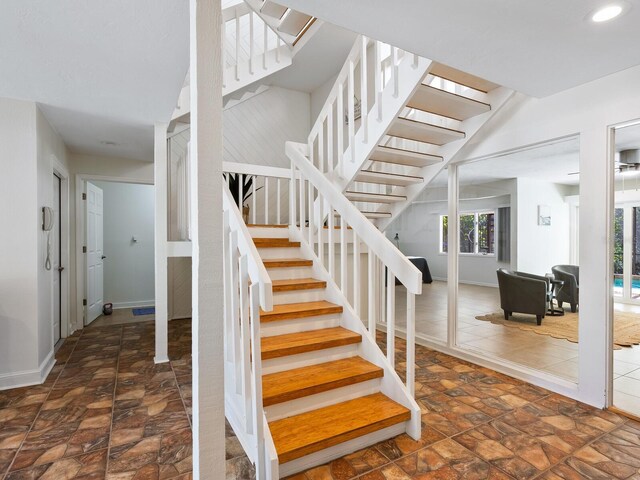 1214 Sea Plume Way, Sarasota, FL 34242 - staircase with stone finish flooring and recessed lighting