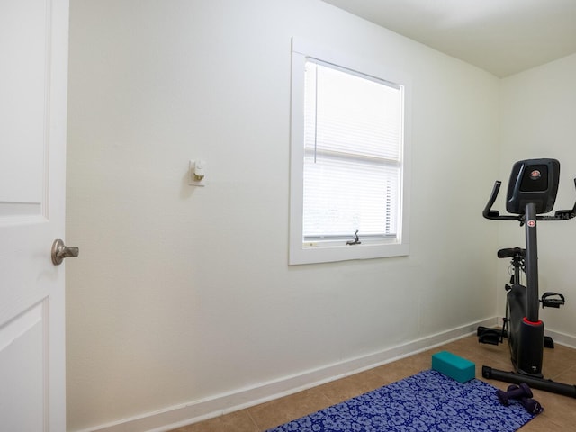 1214 Sea Plume Way, Sarasota, FL 34242 - exercise area featuring tile patterned flooring and baseboards