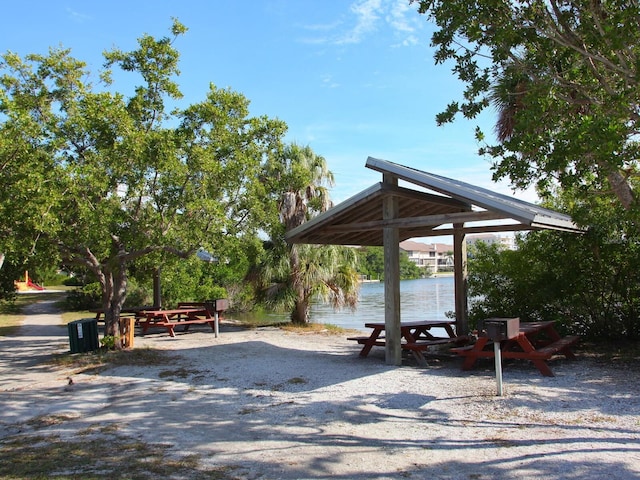 view of home's community featuring a gazebo and a water view