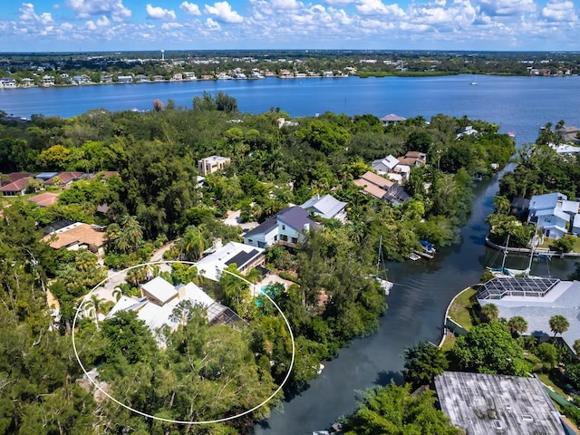 bird's eye view with a water view