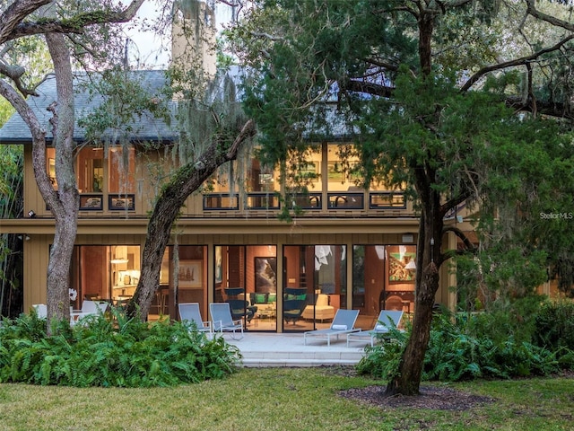 rear view of house featuring a patio area