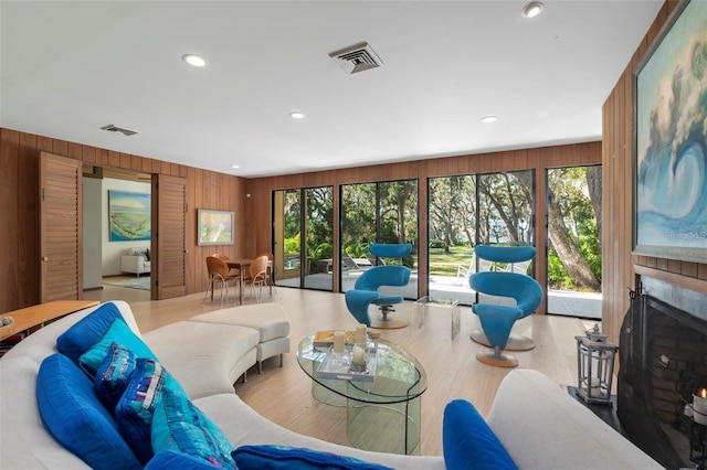 living room featuring wooden walls