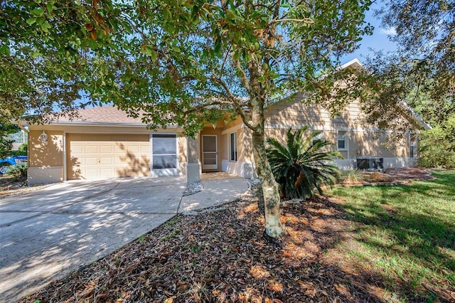 single story home featuring a garage