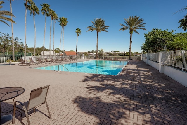 view of swimming pool featuring a patio