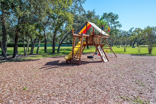 view of play area featuring a lawn