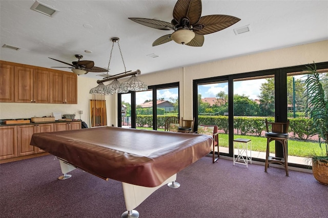 recreation room with dark colored carpet, ceiling fan, and pool table