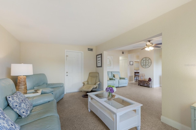 living room featuring light colored carpet