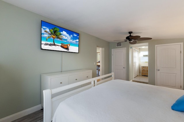 bedroom with wood-type flooring and ceiling fan