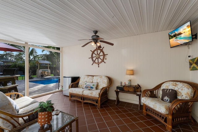 sunroom / solarium with ceiling fan