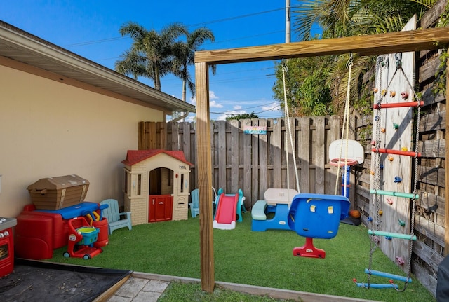 view of jungle gym featuring a yard