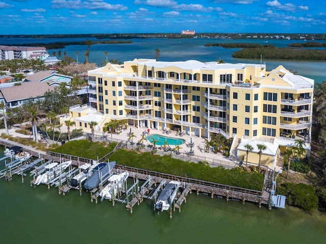 birds eye view of property featuring a water view