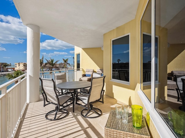 balcony featuring a water view