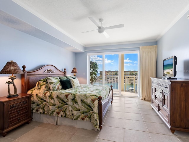 tiled bedroom featuring ceiling fan, ornamental molding, a textured ceiling, and access to outside