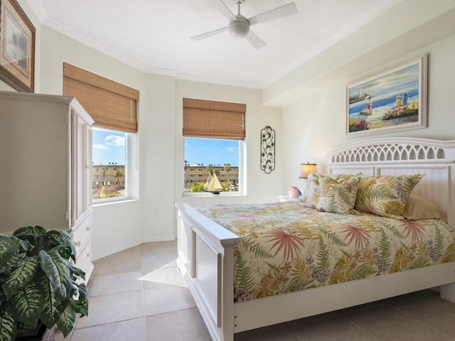 bedroom with ceiling fan, light tile patterned floors, and crown molding