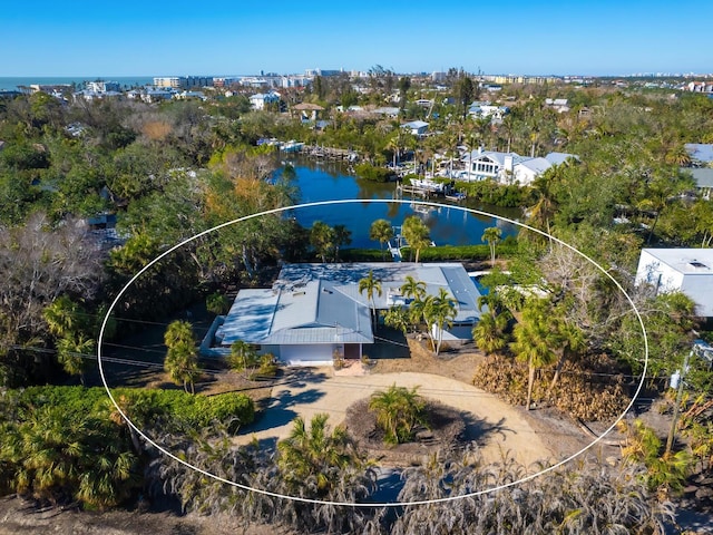 bird's eye view with a water view