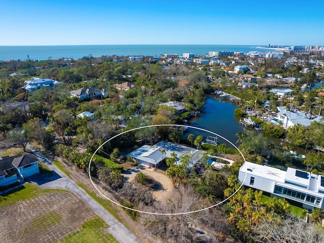 bird's eye view with a water view