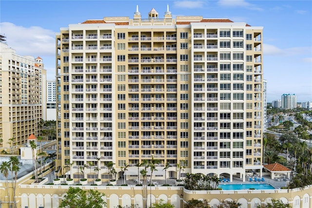 view of property featuring a community pool