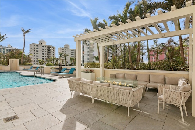 view of patio featuring a pergola, outdoor lounge area, and a community pool