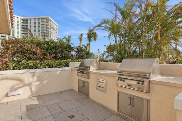 view of patio / terrace featuring an outdoor kitchen and grilling area