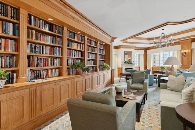 sitting room with crown molding, built in features, and a chandelier