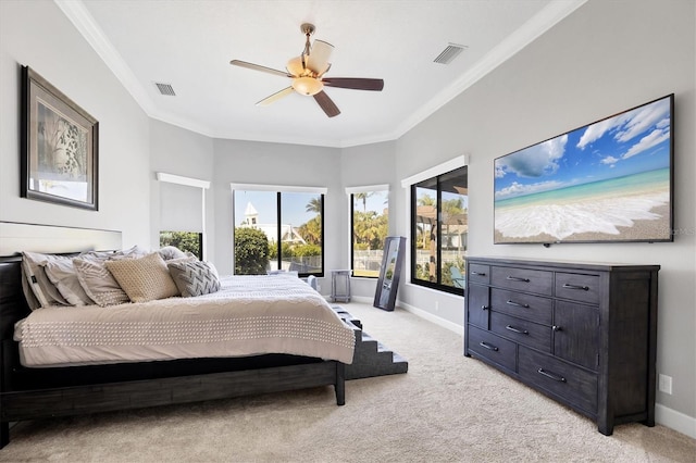 bedroom featuring light carpet, ceiling fan, and ornamental molding