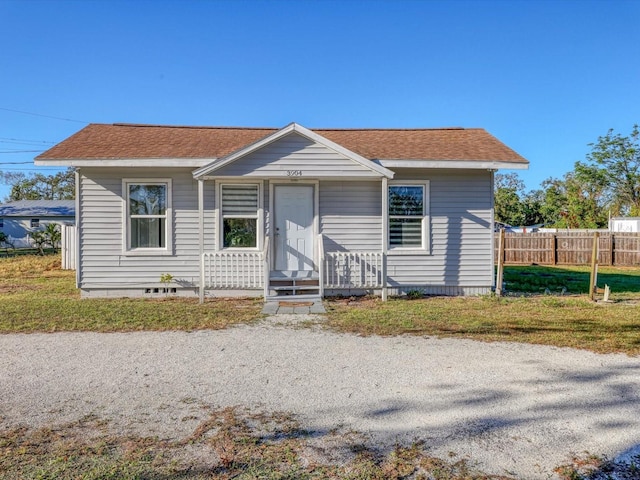 bungalow with a front yard