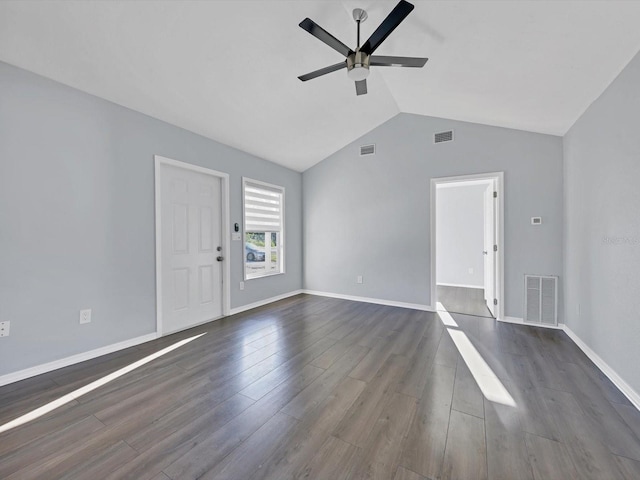 unfurnished living room featuring ceiling fan, dark wood-type flooring, and vaulted ceiling