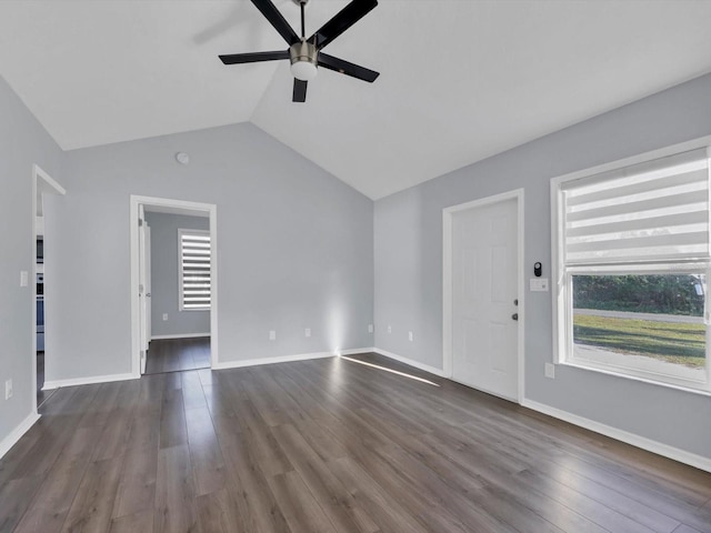 unfurnished living room featuring vaulted ceiling, ceiling fan, and dark hardwood / wood-style floors