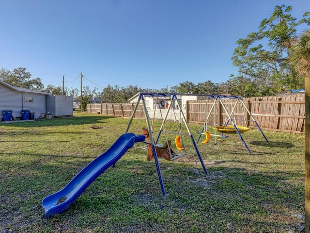 view of playground featuring a lawn