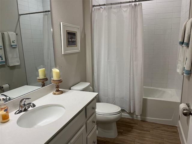 full bathroom with vanity, toilet, wood-type flooring, and shower / bath combo with shower curtain