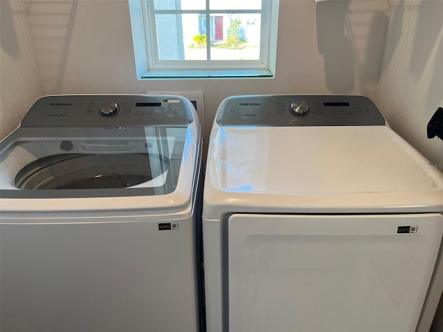 laundry area with washer and clothes dryer