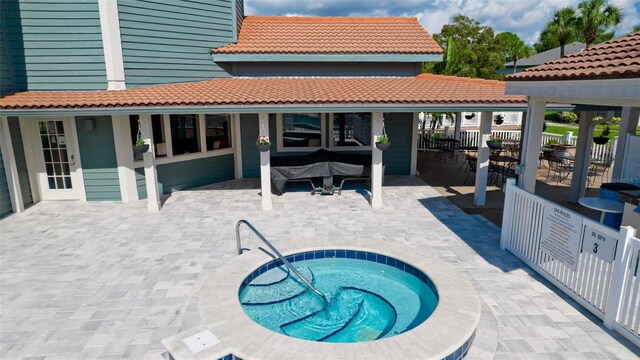 4445 46th Ave W, Bradenton, FL 34210 - view of pool featuring a patio area and a community hot tub