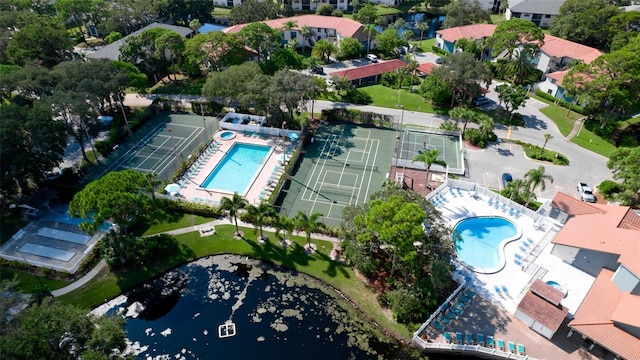 4445 46th Ave W, Bradenton, FL 34210 - aerial overview of property's location featuring a pool area and a nearby body of water