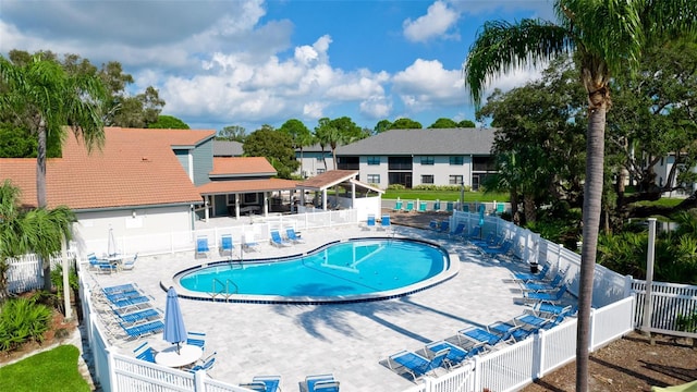 view of swimming pool with a patio