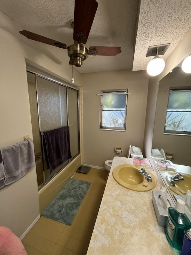 bathroom featuring vanity, a healthy amount of sunlight, wood-type flooring, and walk in shower