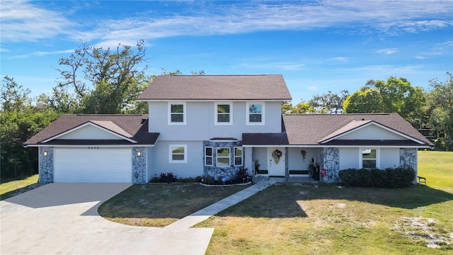 view of front of house featuring a front lawn and a garage