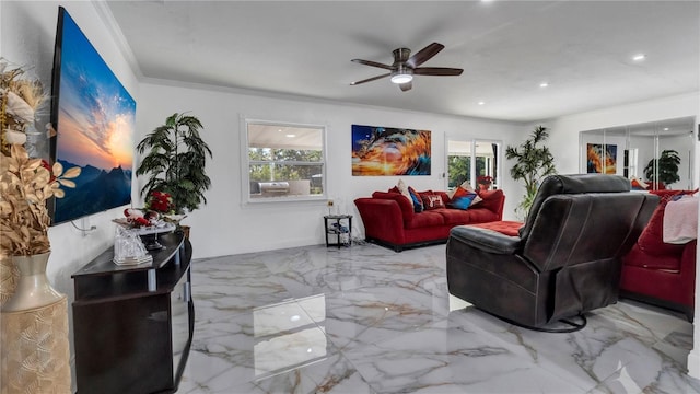 living room with ceiling fan and crown molding