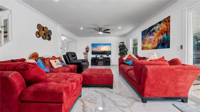 living room featuring ceiling fan and ornamental molding