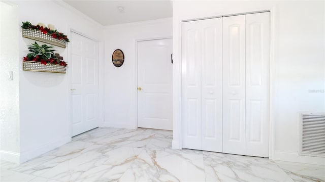 hallway featuring crown molding