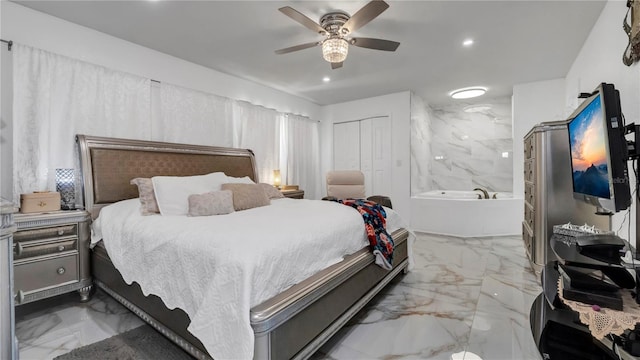 bedroom featuring a closet and ceiling fan