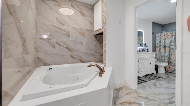 bathroom featuring vanity, toilet, and a tub to relax in