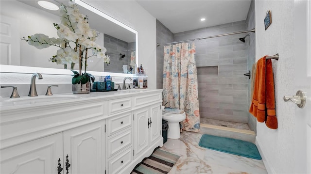 bathroom with a shower with curtain, vanity, and toilet